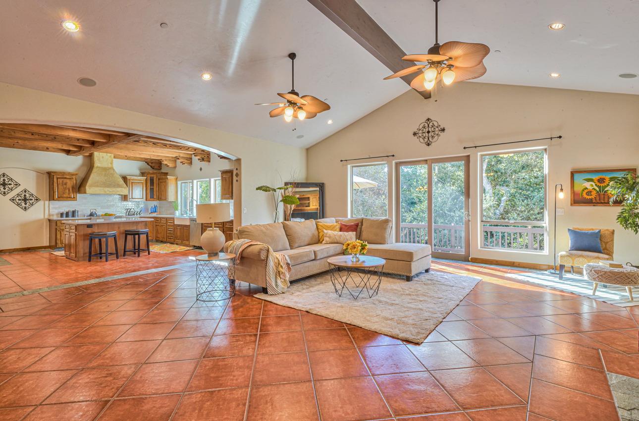 7382 Timeview Way Salinas, CA 93907 - Photo 6 of 79 a living room with fireplace furniture and a chandelier