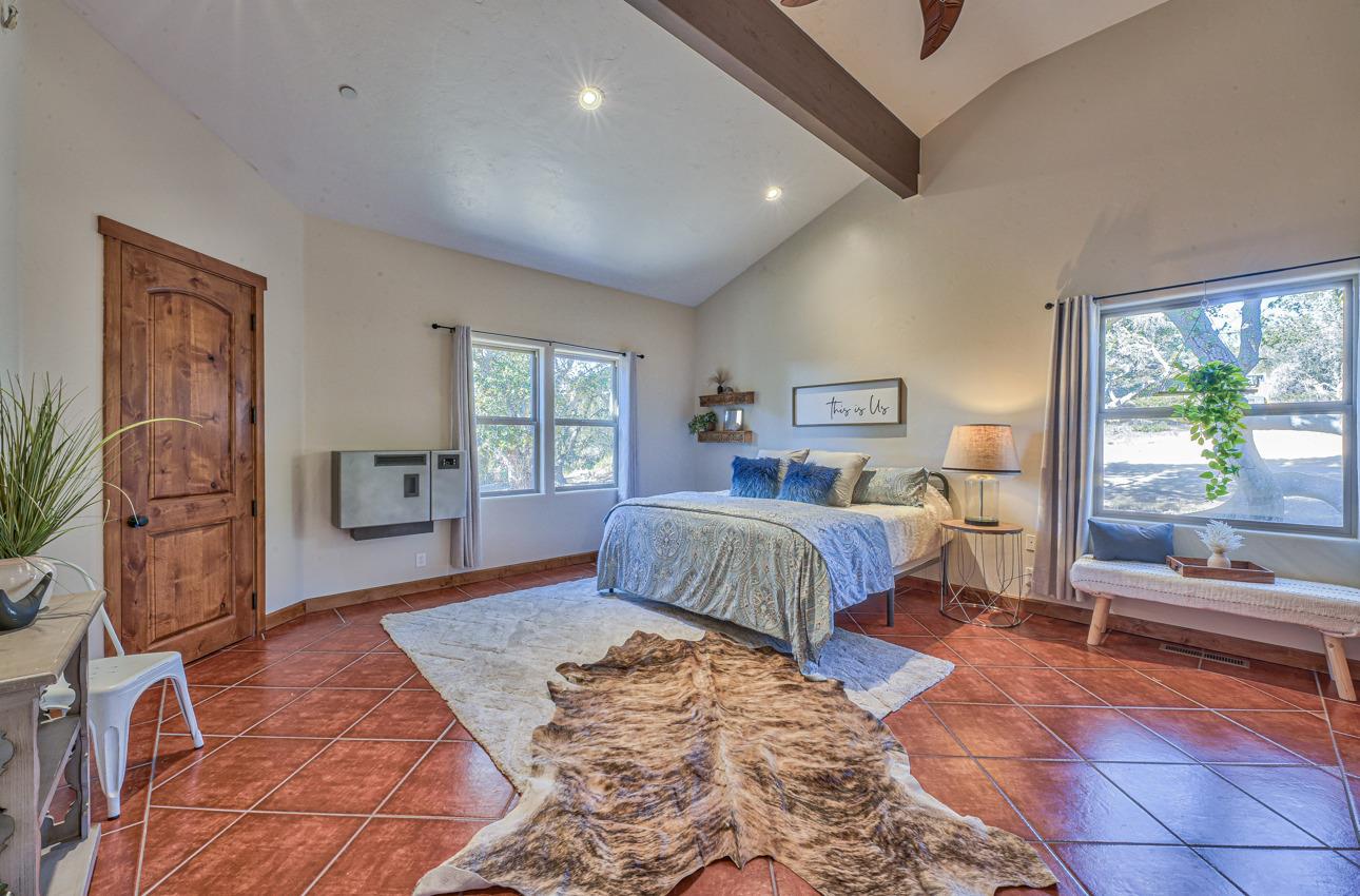 7382 Timeview Way Salinas, CA 93907 - Photo 9 of 79 a spacious bedroom with a large bed and a window