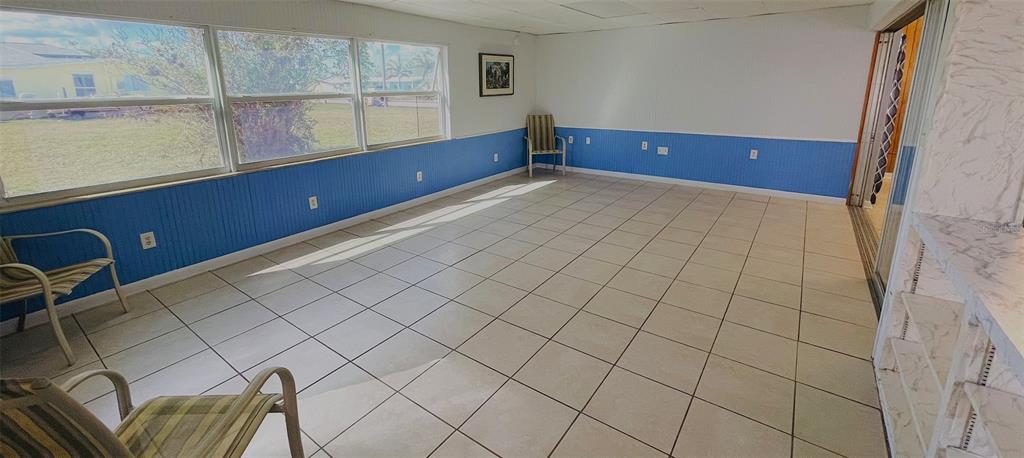 554 Lindley Terrace Port Charlotte, FL 33952 - Photo 15 of 57 a view of a livingroom with an empty space and a window
