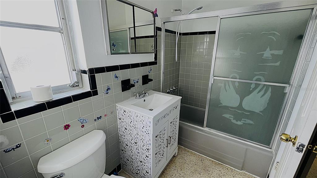 554 Lindley Terrace Port Charlotte, FL 33952 - Photo 27 of 57 a bathroom with a sink a toilet and shower
