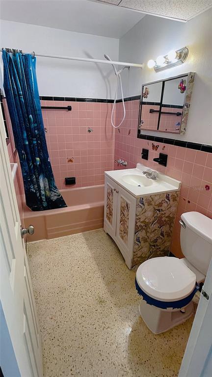 554 Lindley Terrace Port Charlotte, FL 33952 - Photo 31 of 57 a bathroom with a sink a toilet and shower