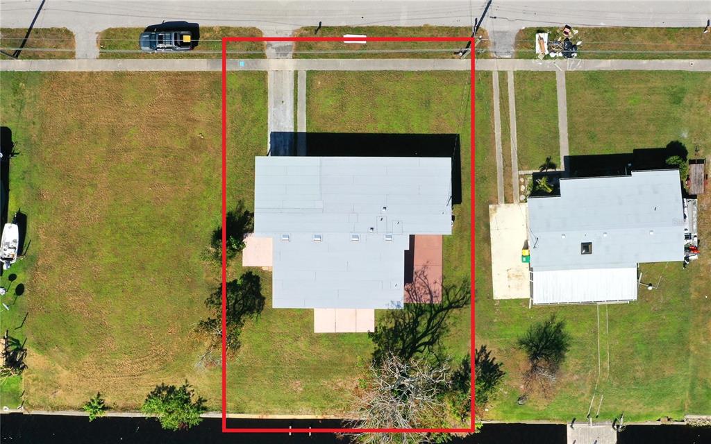 554 Lindley Terrace Port Charlotte, FL 33952 - Photo 44 of 57 an aerial view of residential houses with outdoor space