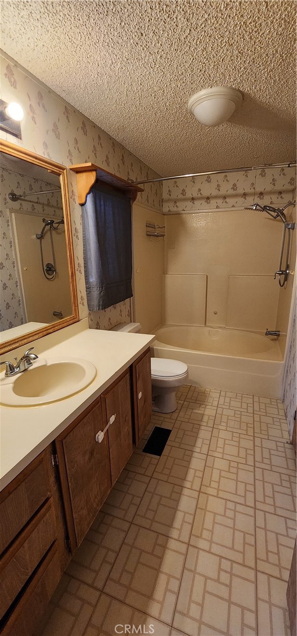 3589 West Wells Road, Unit 99 Blythe, CA 92225 - Photo 12 of 26 a bathroom with a sink a toilet and shower