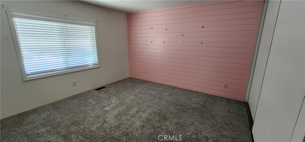 3589 West Wells Road, Unit 99 Blythe, CA 92225 - Photo 10 of 26 an empty room with a window