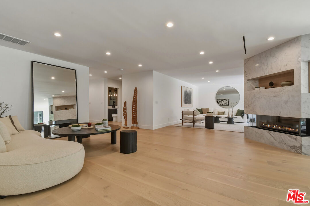 3721 Woodcliff Road Sherman Oaks, CA 91403 - Photo 7 of 35 a lobby with furniture and a large window