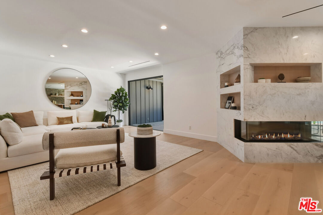 3721 Woodcliff Road Sherman Oaks, CA 91403 - Photo 9 of 35 a living room with furniture