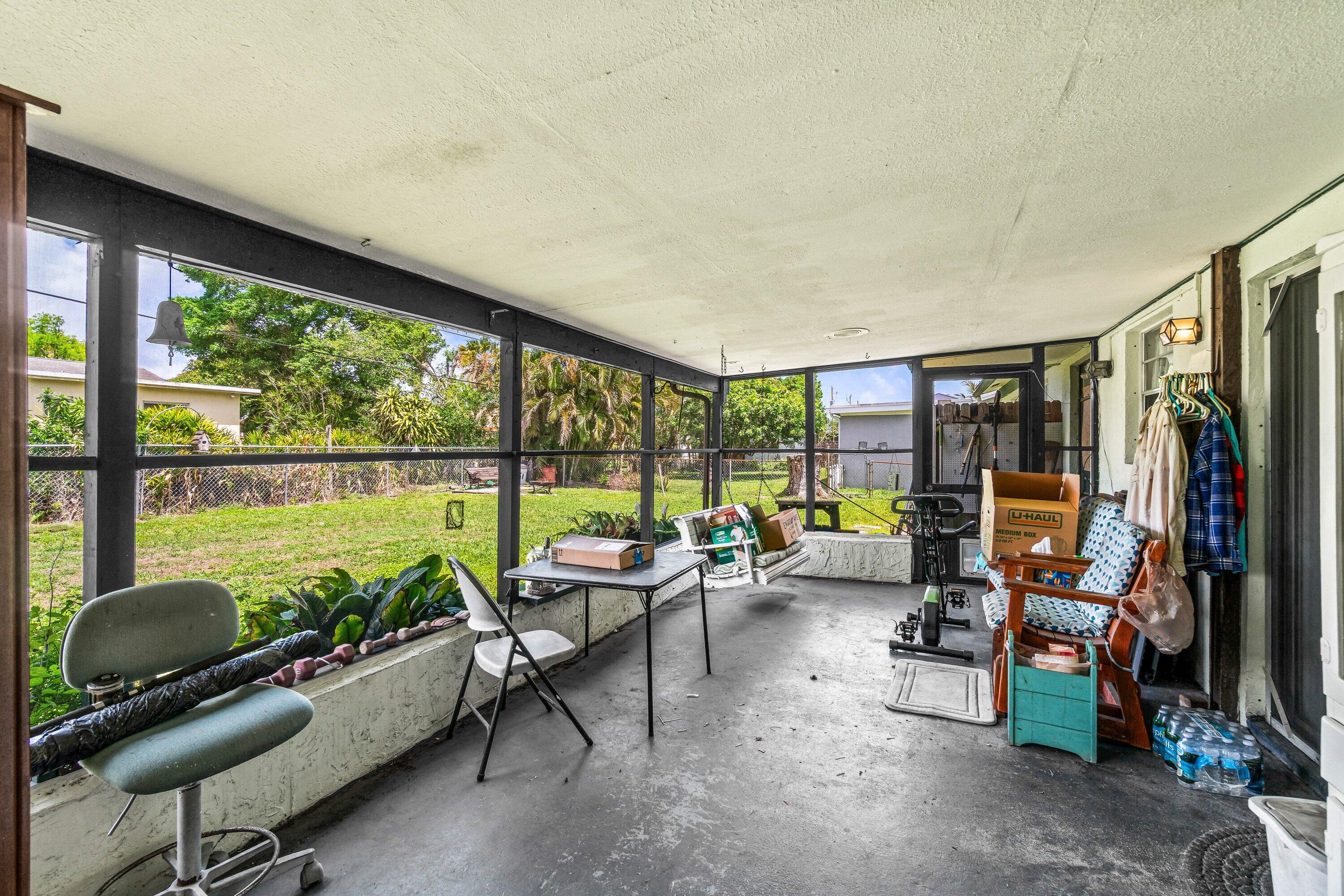 3481 Amberjack Road Lantana, FL 33462 - Photo 18 of 39 SCREENED COVERED PATIO