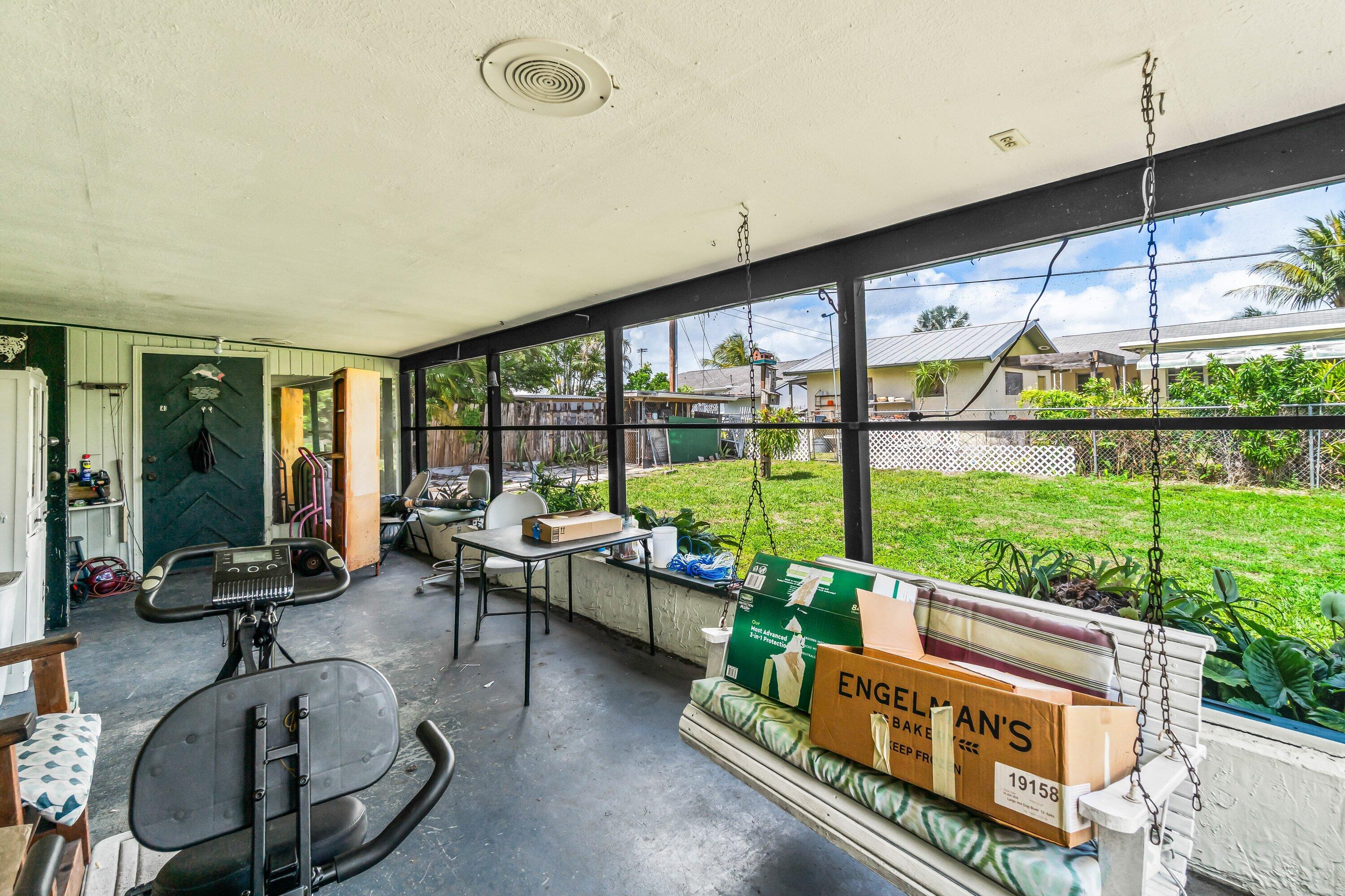 3481 Amberjack Road Lantana, FL 33462 - Photo 19 of 39 SCREENED COVERED PATIO