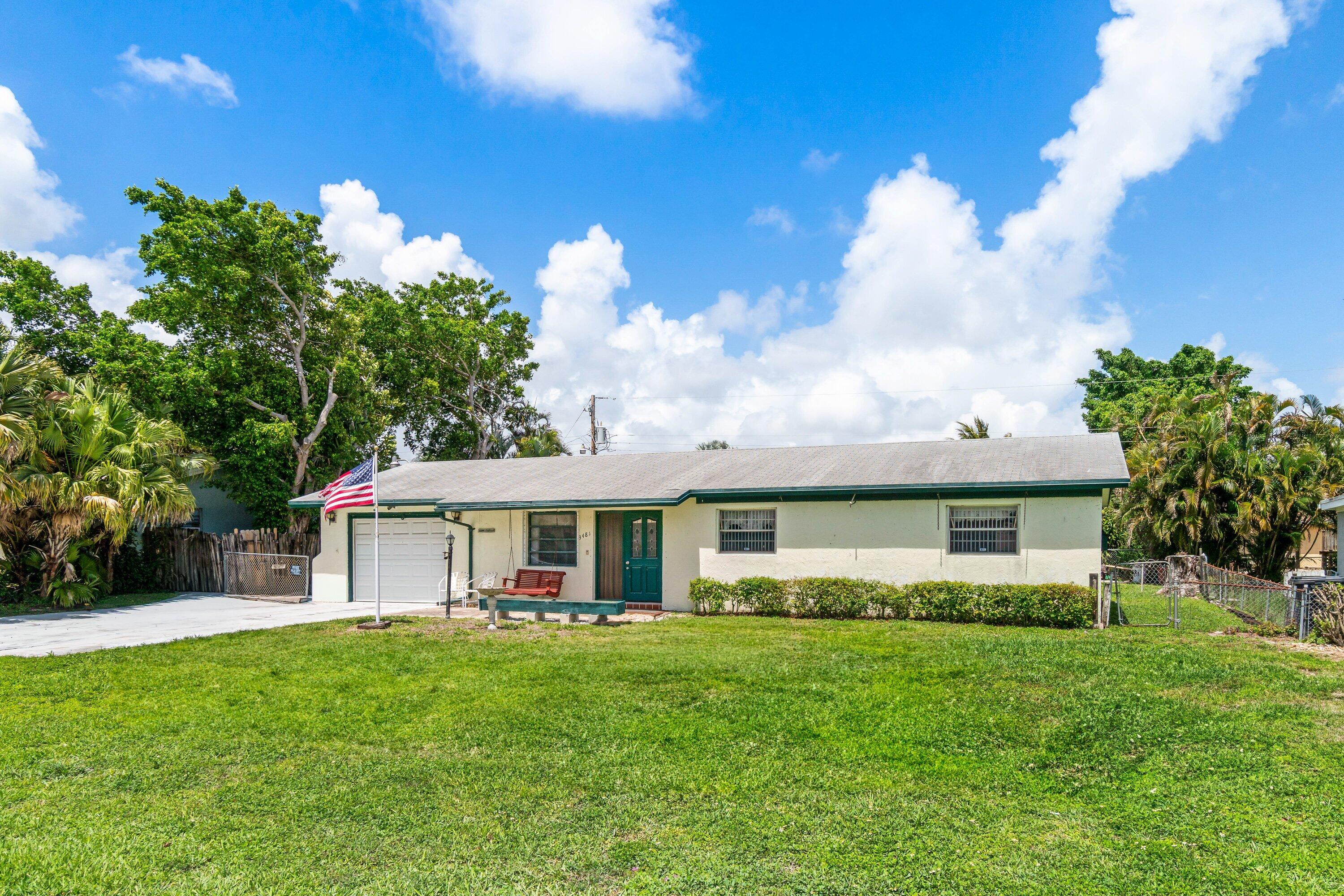 3481 Amberjack Road Lantana, FL 33462 - Photo 3 of 39 FRONT