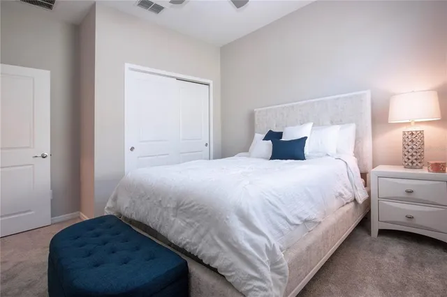 an aerial view of a dining table and chairs in a patio