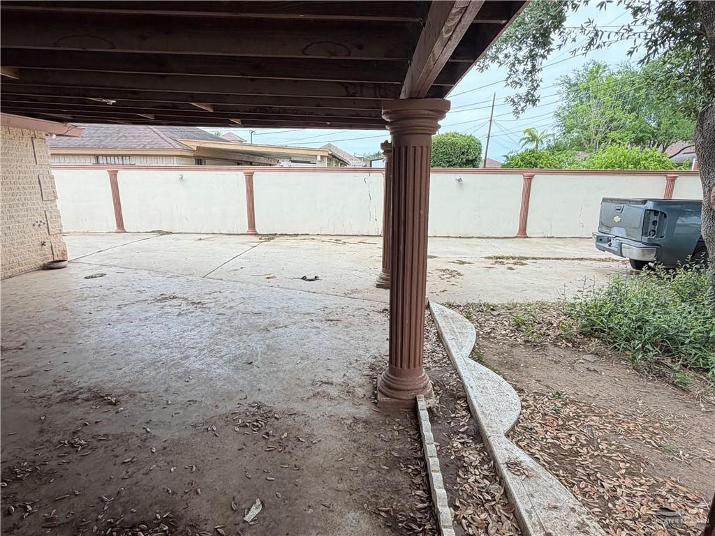 937 Whitewing Street Roma, TX 78584 - Photo 13 of 14 Fenced backyard with a patio