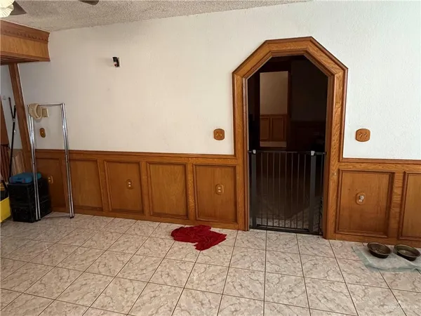 a bedroom with bed and a window