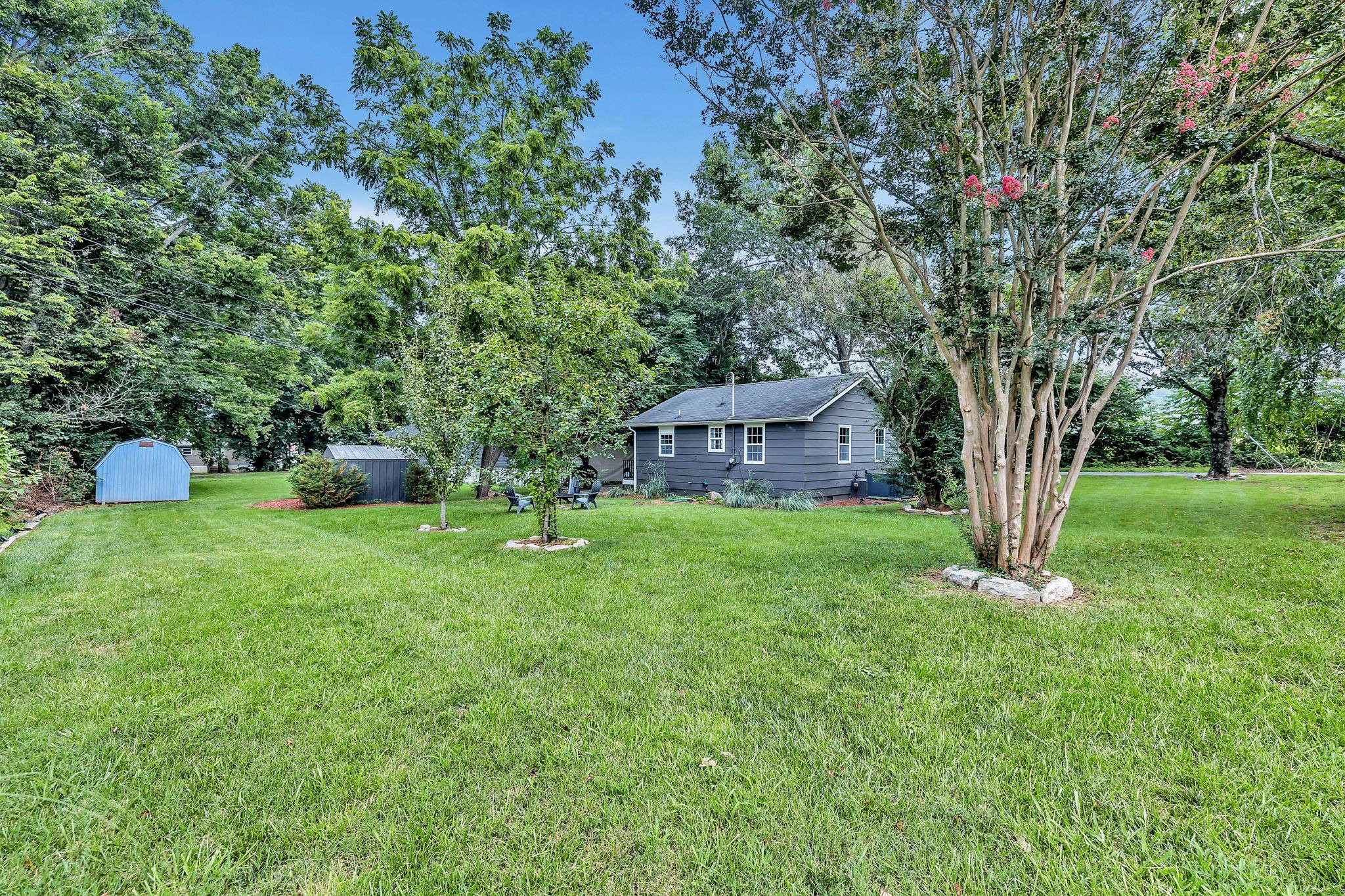 124 Good Neighbors Road Franklin, TN 37064 - Photo 18 of 27 Massive backyard on a corner lot with privacy fence and tree-line