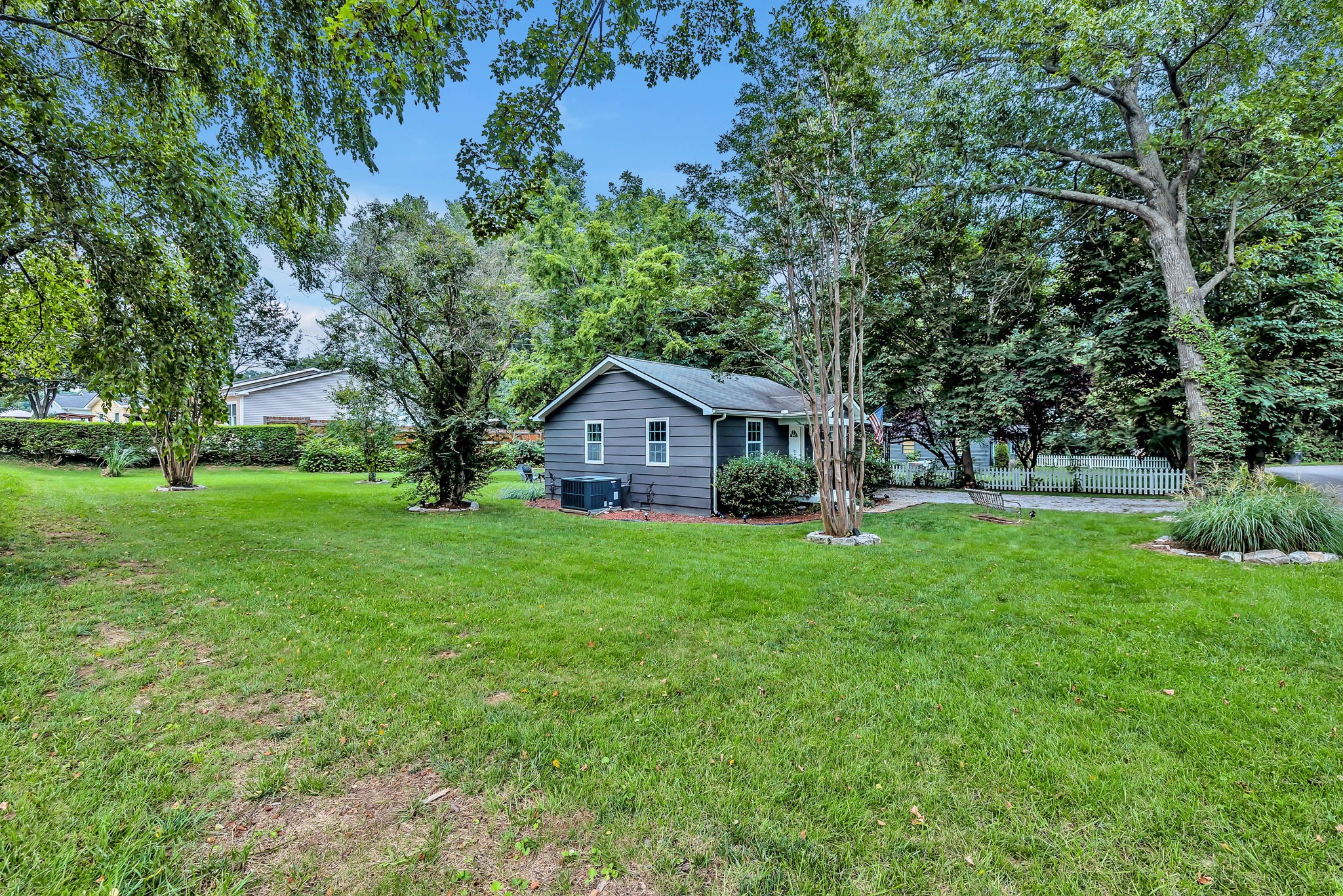 124 Good Neighbors Road Franklin, TN 37064 - Photo 3 of 27 Side yard with open yard