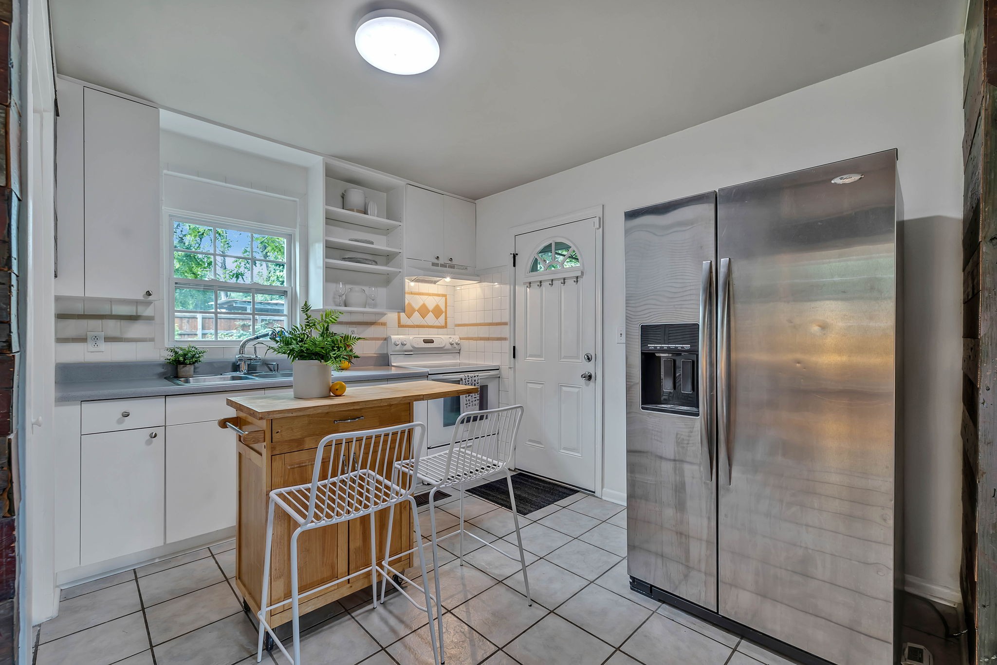 124 Good Neighbors Road Franklin, TN 37064 - Photo 10 of 27 Beautiful bright kitchen with a view of the backyard