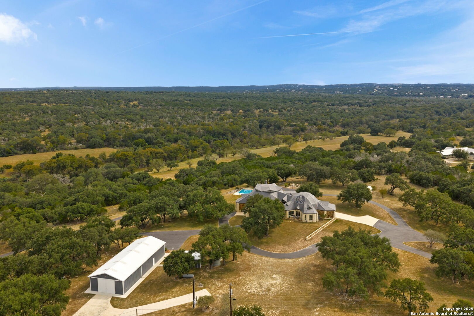 117 Clear Spring Drive Boerne, TX 78006 - Photo 12 of 54 an aerial view of residential houses with outdoor space and trees