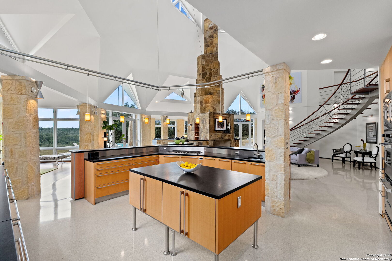 117 Clear Spring Drive Boerne, TX 78006 - Photo 26 of 54 a kitchen with stainless steel appliances granite countertop a sink and a stove