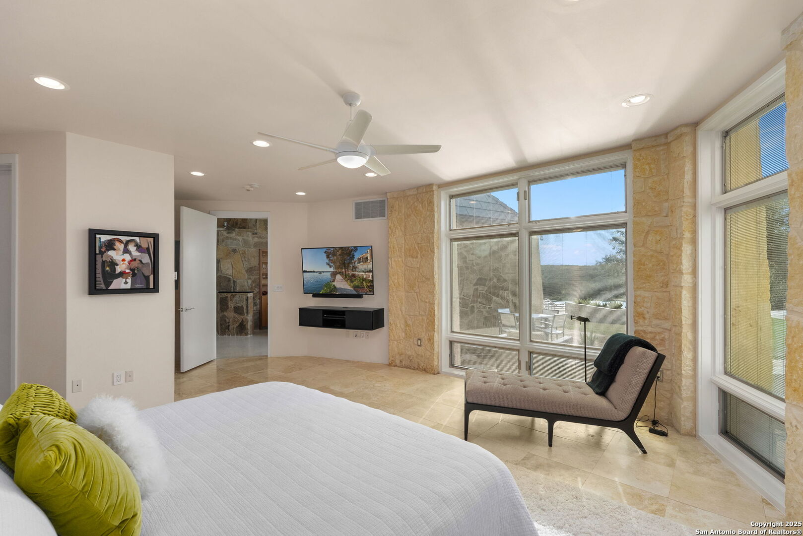 117 Clear Spring Drive Boerne, TX 78006 - Photo 33 of 54 a bedroom with a bed and a large window