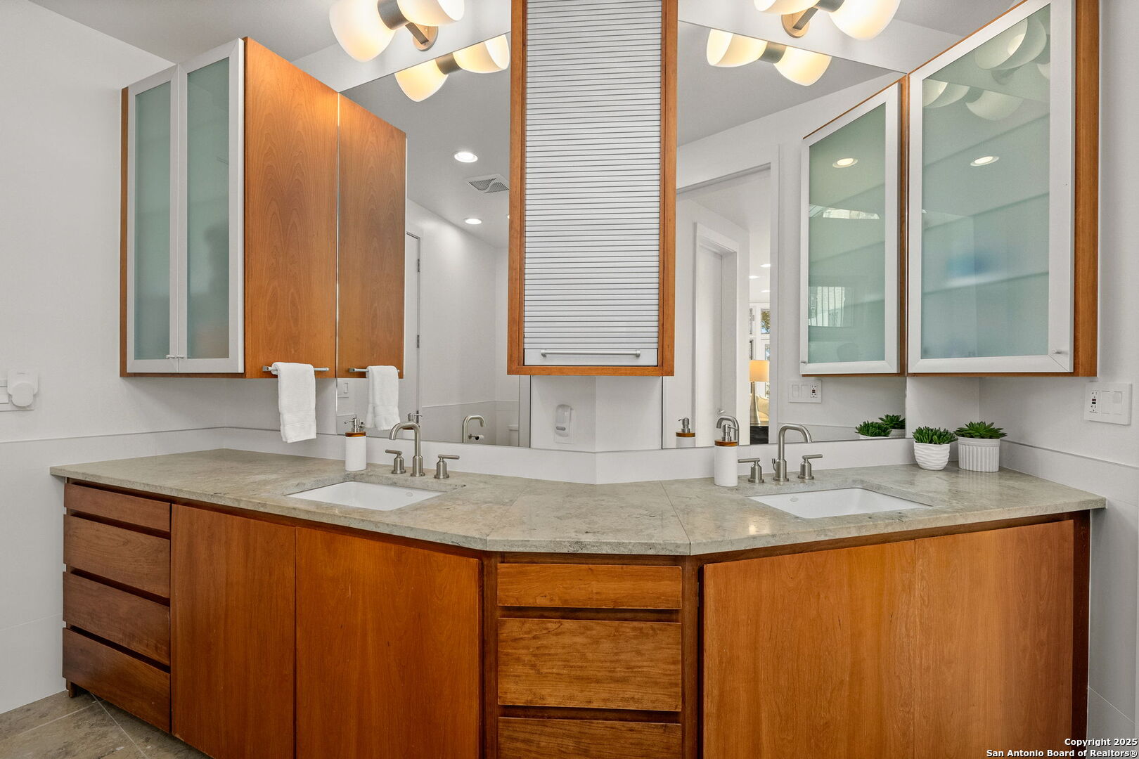 117 Clear Spring Drive Boerne, TX 78006 - Photo 36 of 54 a bathroom with a granite countertop sink and a mirror