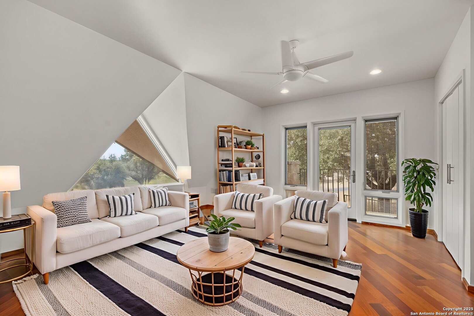 117 Clear Spring Drive Boerne, TX 78006 - Photo 40 of 54 a living room with furniture and a large window