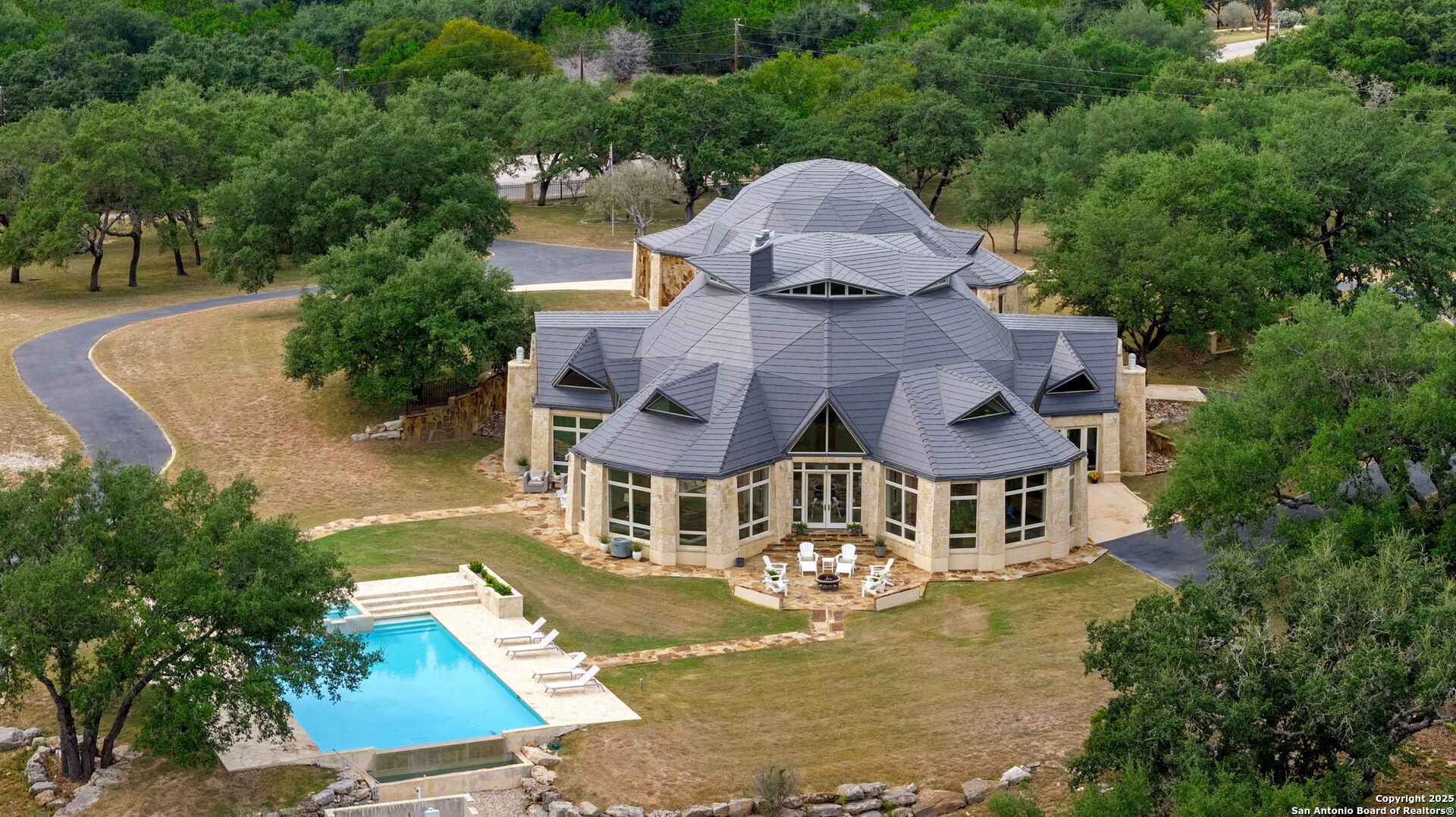 117 Clear Spring Drive Boerne, TX 78006 - Photo 53 of 54 an aerial view of a house with swimming pool a yard and lake view
