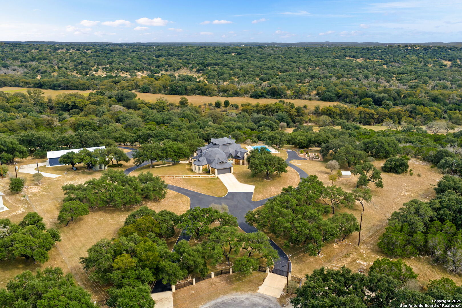 117 Clear Spring Drive Boerne, TX 78006 - Photo 9 of 54 an aerial view of residential houses with outdoor space and trees