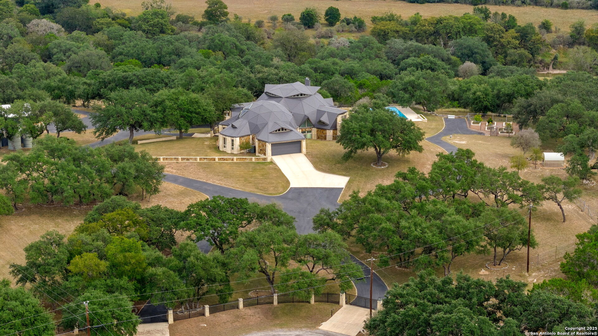 117 Clear Spring Drive Boerne, TX 78006 - Photo 10 of 54 an aerial view of a house with yard swimming pool and outdoor seating