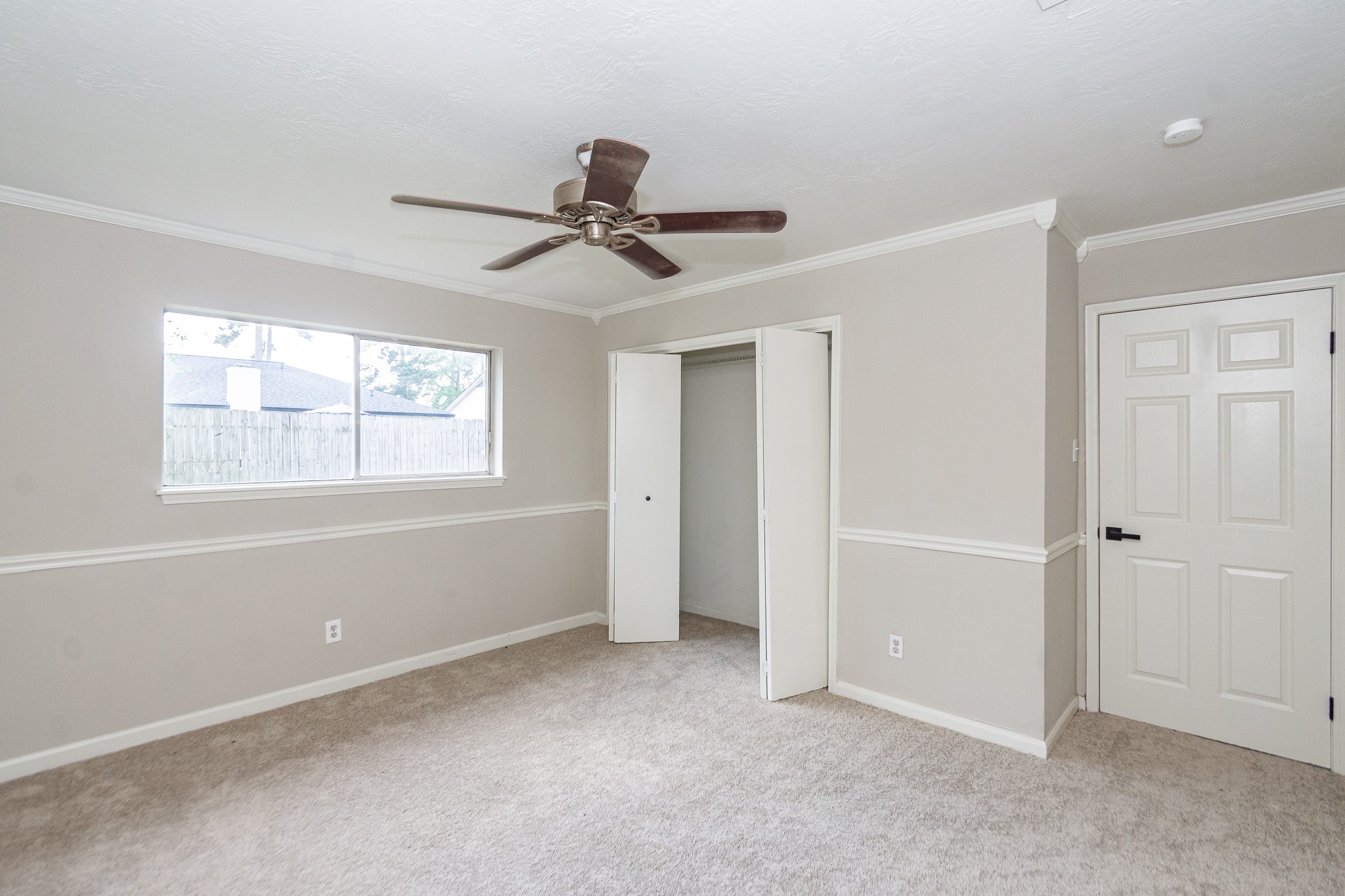 29019 Stapleford Street Spring, TX 77386 - Photo 18 of 27 a view of room with a ceiling fan and window