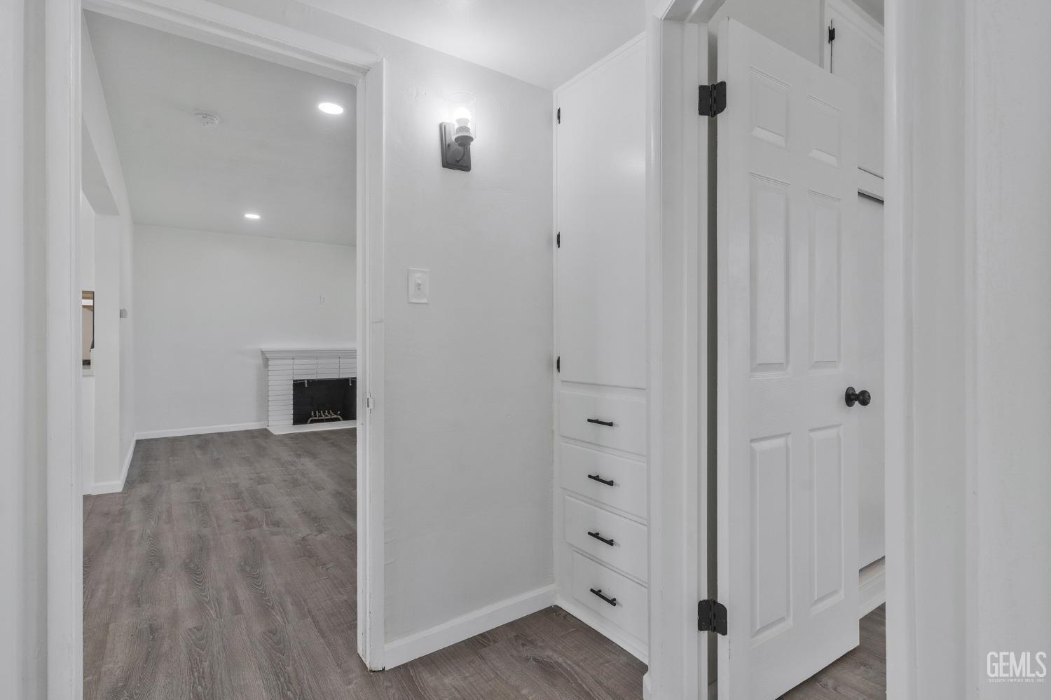 Undisclosed Address Bakersfield, CA 93304 - Photo 11 of 29 a view of hallway with wooden floor