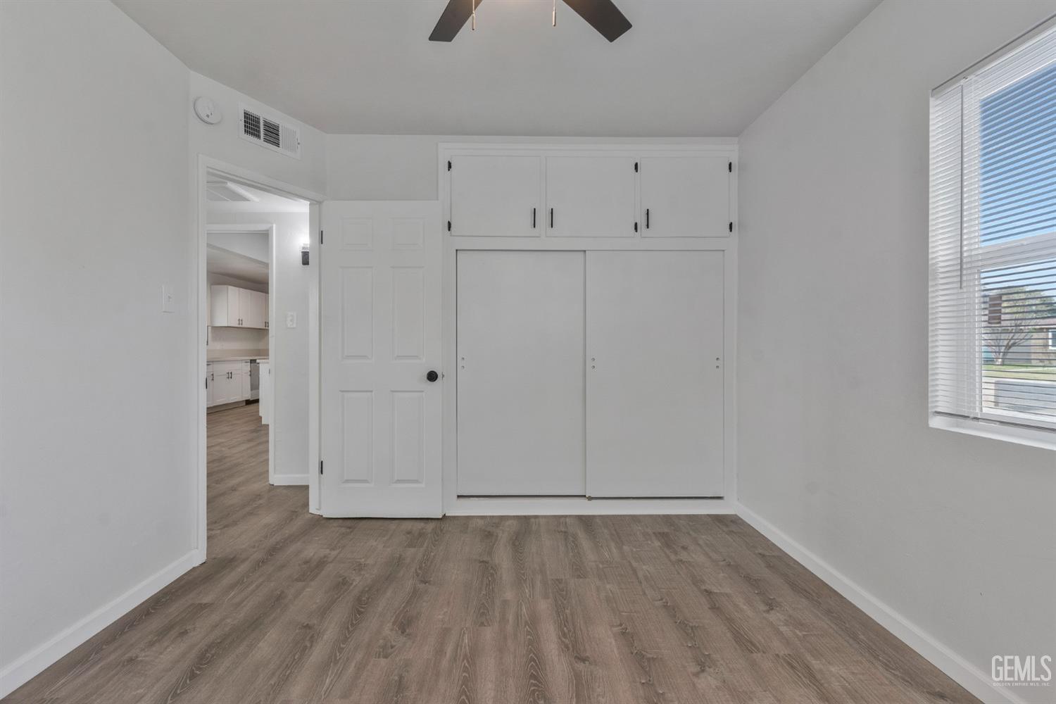 Undisclosed Address Bakersfield, CA 93304 - Photo 15 of 29 a view of an empty room with a window