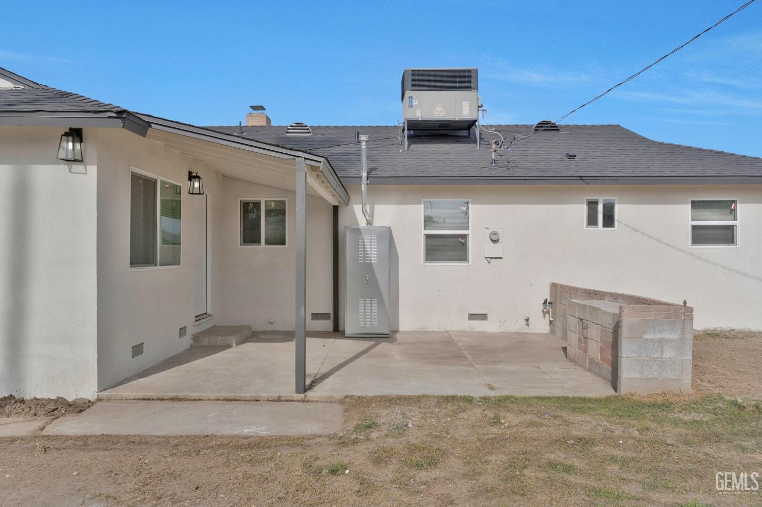 Undisclosed Address Bakersfield, CA 93304 - Photo 24 of 29 a front view of a house with a yard