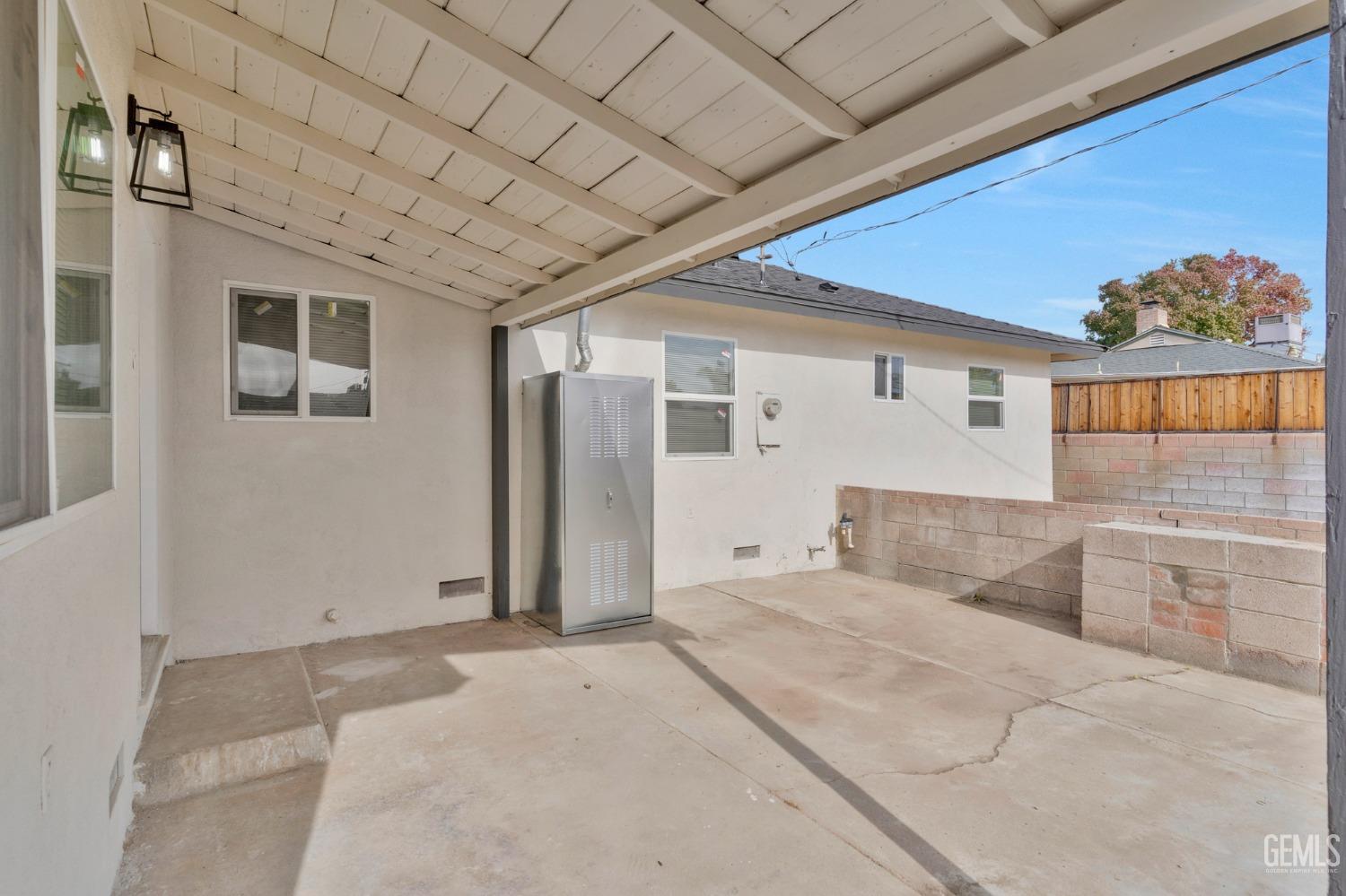 Undisclosed Address Bakersfield, CA 93304 - Photo 26 of 29 a view of a livingroom with wooden floor and a large window