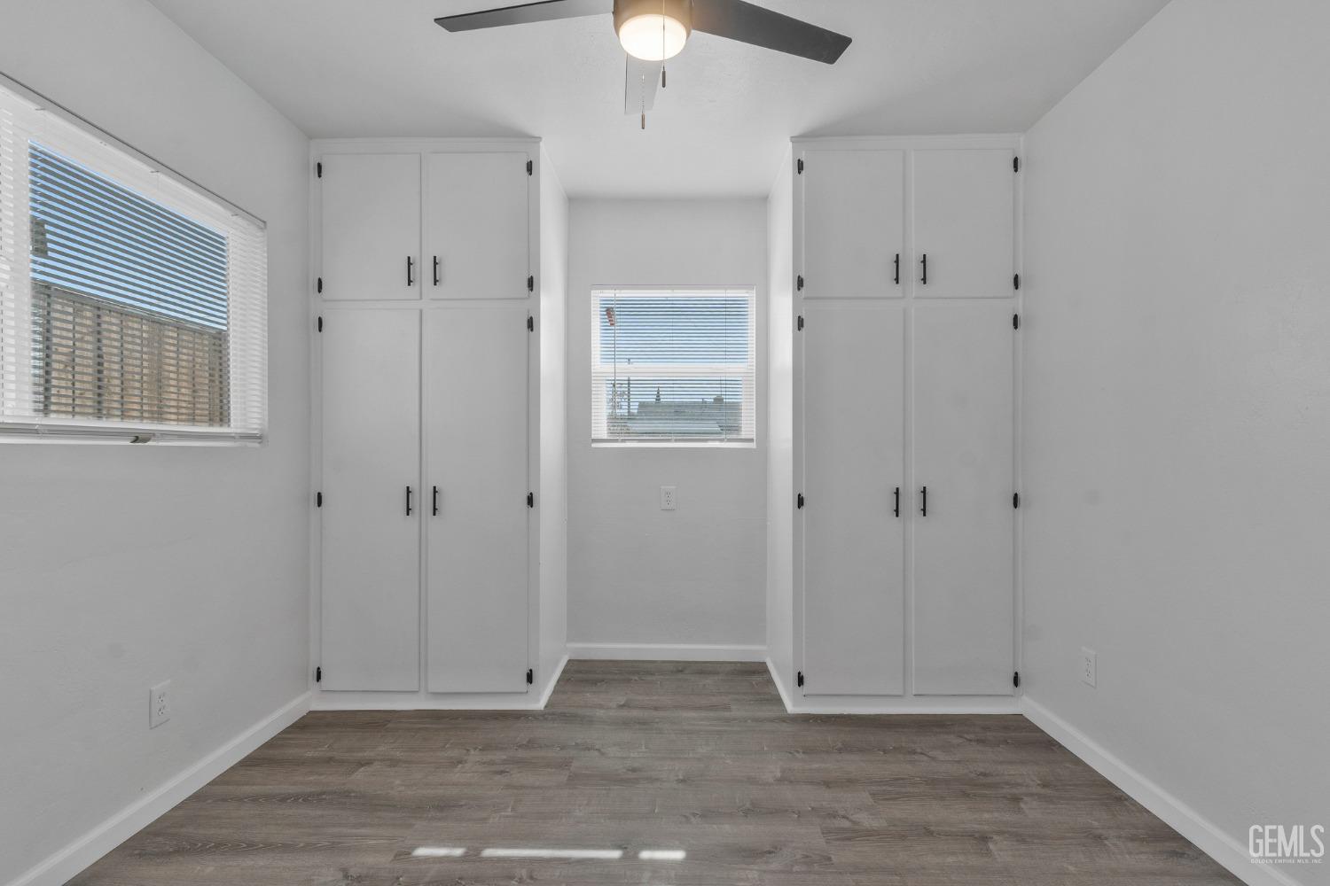 Undisclosed Address Bakersfield, CA 93304 - Photo 9 of 29 a view of an empty room with window and chandelier fan