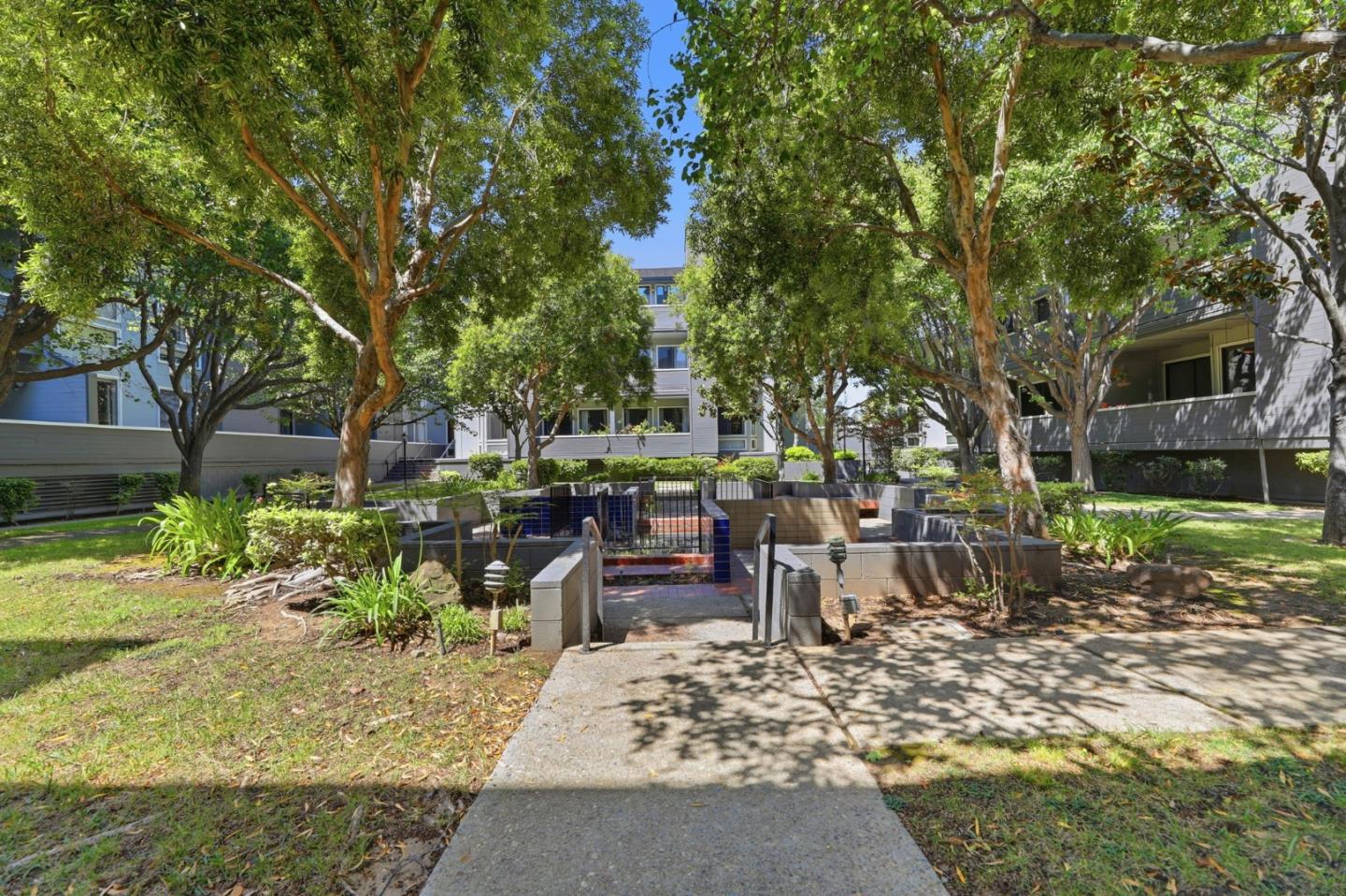 22330 Homestead Road, Unit 226 Cupertino, CA 95014 - Photo 38 of 38 a view of a backyard with sitting area furniture and garden
