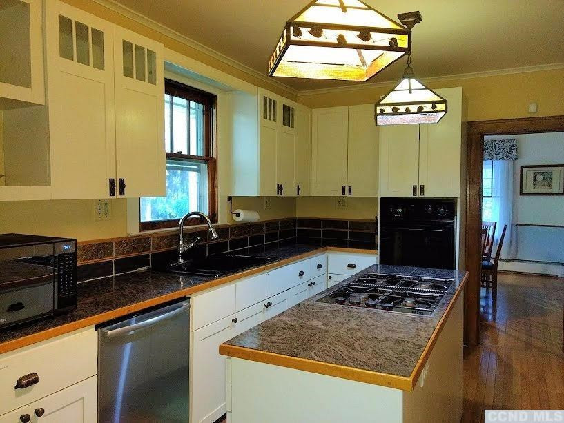 20 Hunt Road Hillsdale, NY 12529 - Photo 2 of 10 a kitchen with a counter and a stove