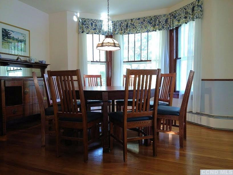 20 Hunt Road Hillsdale, NY 12529 - Photo 3 of 10 a view of a dining room with furniture window and wooden floor