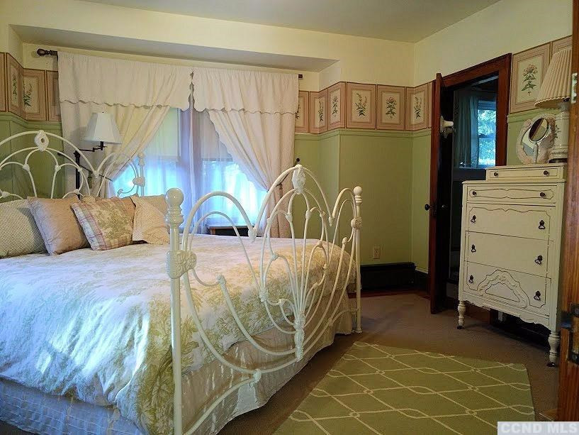 20 Hunt Road Hillsdale, NY 12529 - Photo 7 of 10 a bedroom with a bed and a television