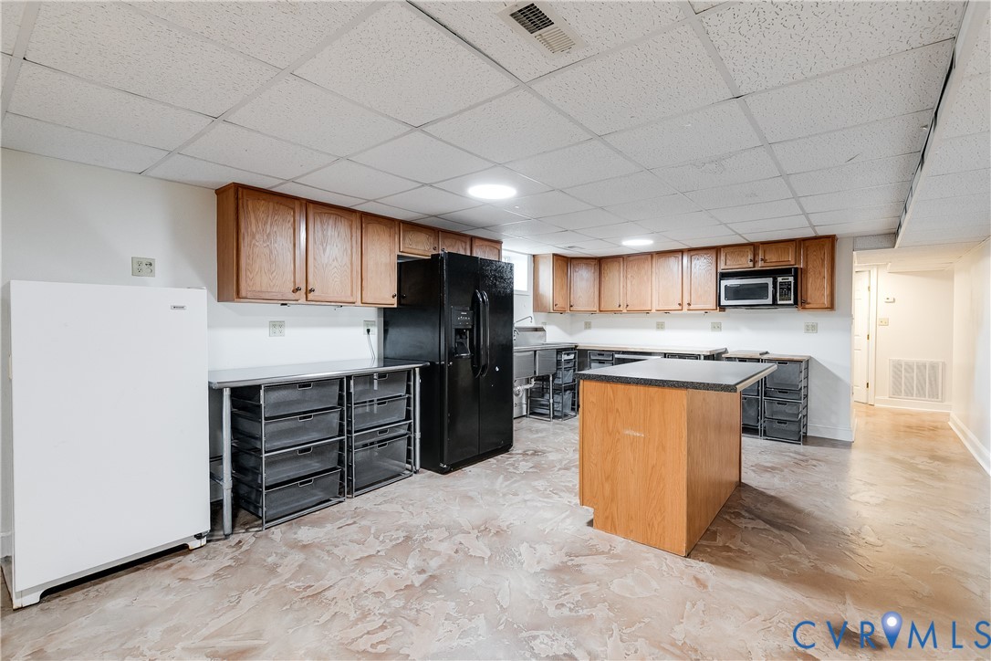 12365 Ashcake Road Ashland, VA 23005 - Photo 56 of 80 Spacious lower-level kitchen featuring wood cabine