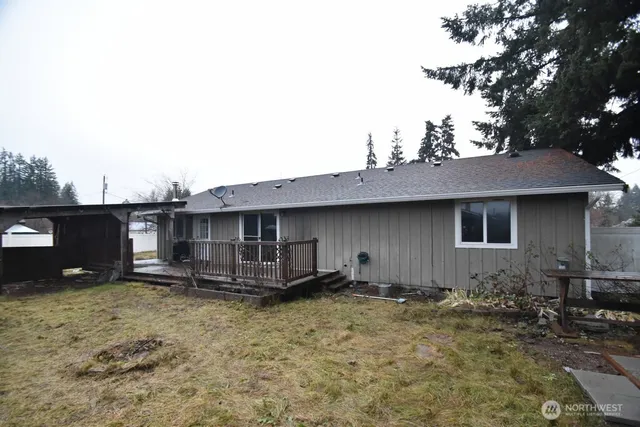 a house view with a backyard space