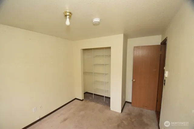 a view of a room with an empty space