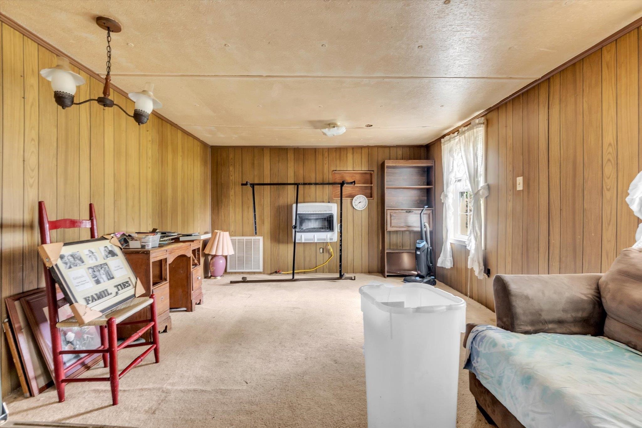 216 Burch Road Dyersburg, TN 38024 - Photo 13 of 25 a living room with furniture and a window