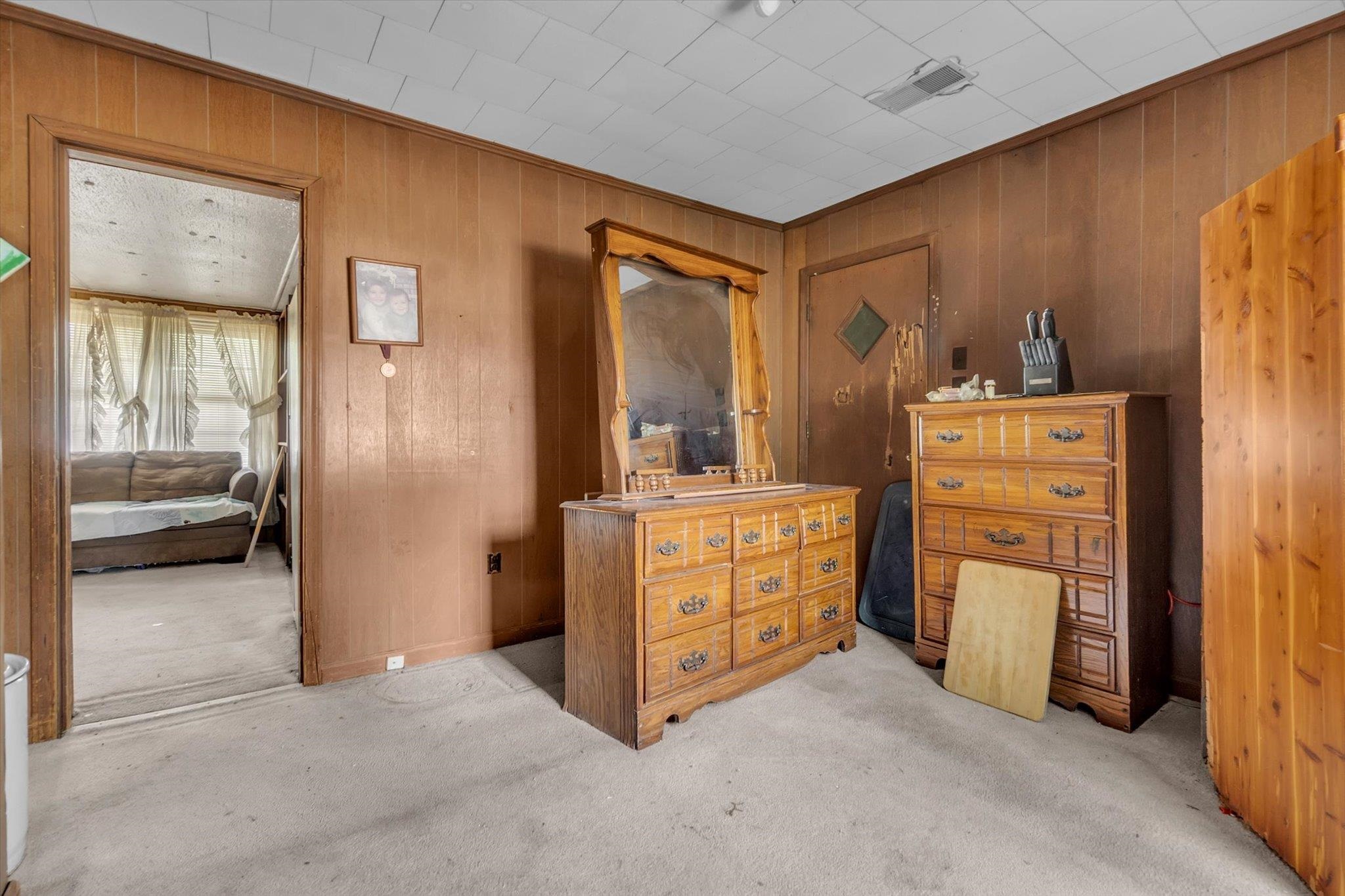 216 Burch Road Dyersburg, TN 38024 - Photo 15 of 25 a view of room with furniture and a refrigerator