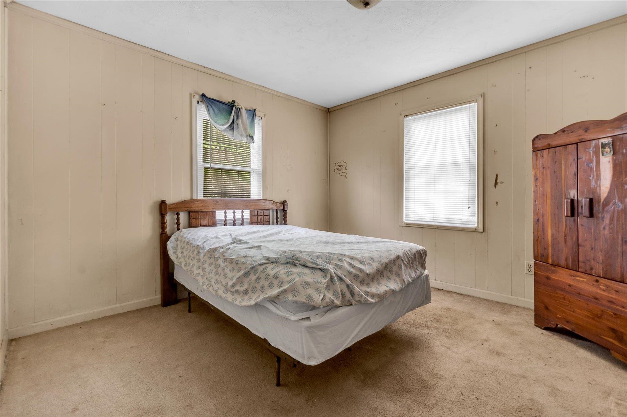 216 Burch Road Dyersburg, TN 38024 - Photo 16 of 25 a bedroom with a bed lamp closet and window
