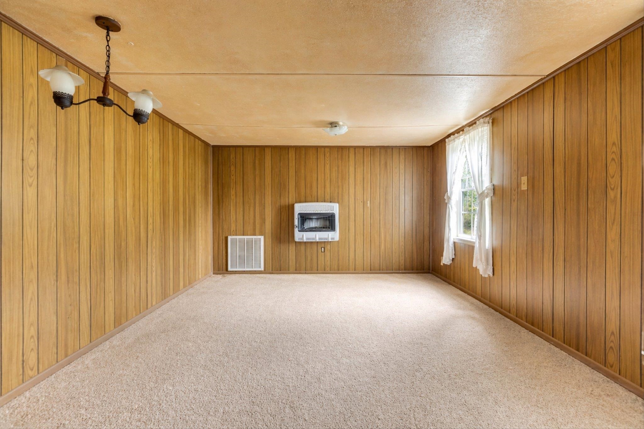 216 Burch Road Dyersburg, TN 38024 - Photo 17 of 25 a view of a hallway with a wooden fence