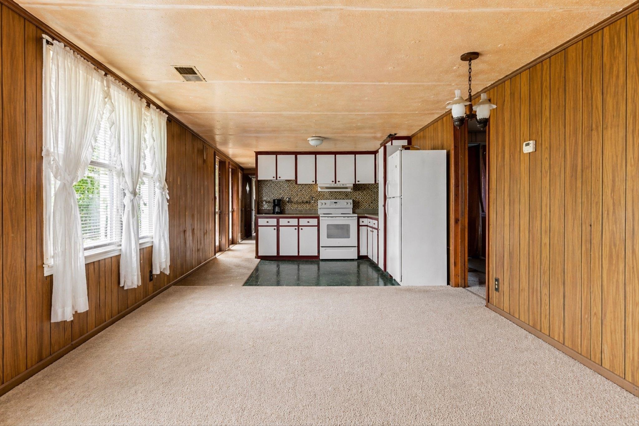 216 Burch Road Dyersburg, TN 38024 - Photo 18 of 25 a view of a hallway with wooden floor and staircase