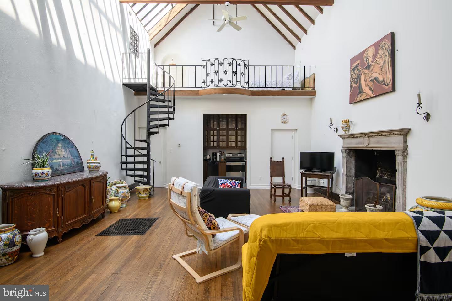 114 Llanfair Road Ardmore, PA 19003 - Photo 60 of 80 a living room with furniture and a fireplace