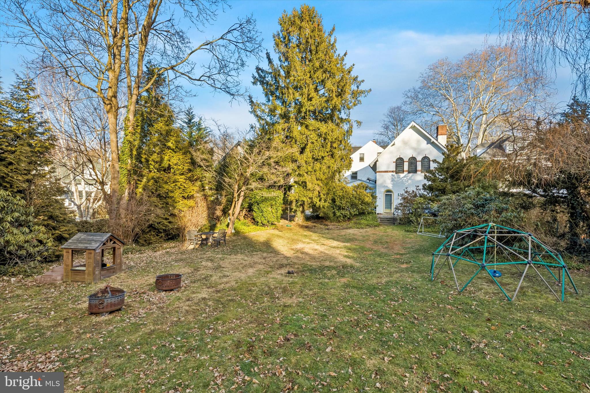 114 Llanfair Road Ardmore, PA 19003 - Photo 10 of 80 a view of a yard with yellow house