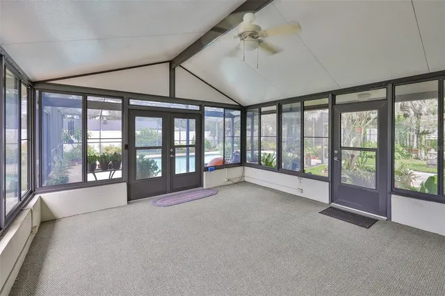a view of an empty room with a balcony