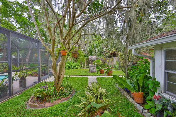 a view of a backyard with garden