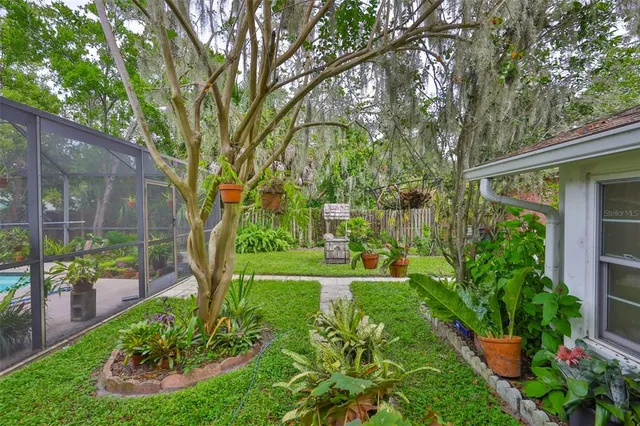 a view of a backyard with garden